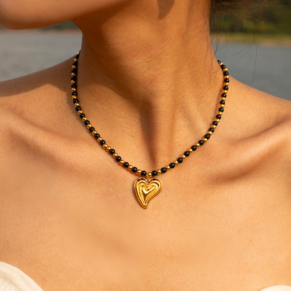 Black and gold heart necklace